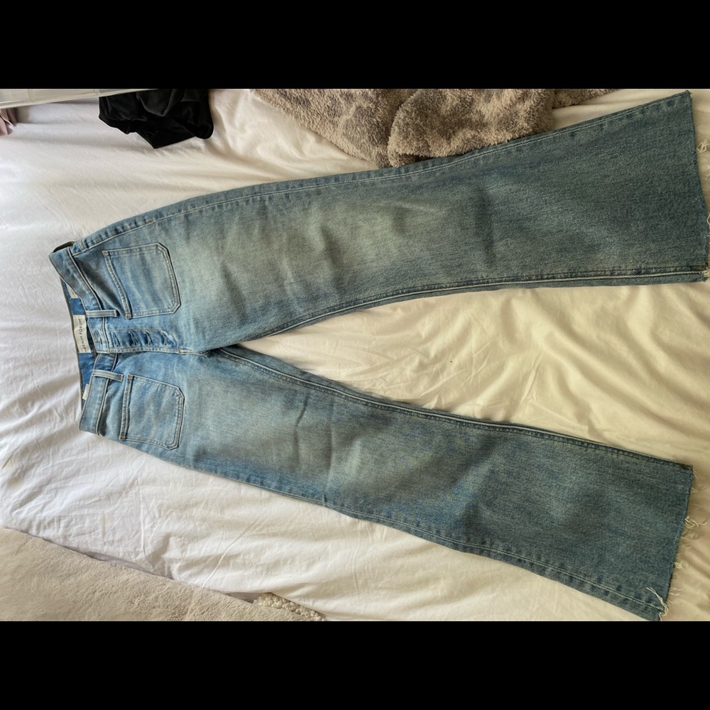 Denim forum jeans with little pockets at hips